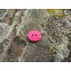 Bouton gaufre oval fuschia 15mm